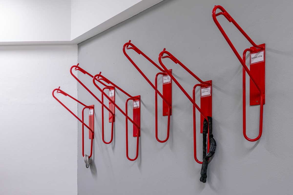 Stojany na kole v garážích Qubix